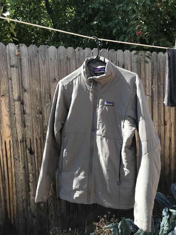 ripped patagonia jacket