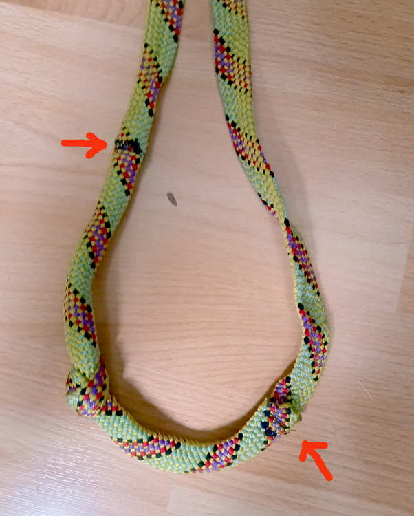 Reslinging cams with webbing tied in a water knot