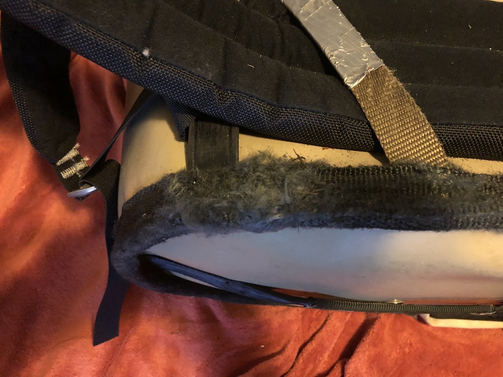 repaired torn ripped handbag bag purse shoulder strap
