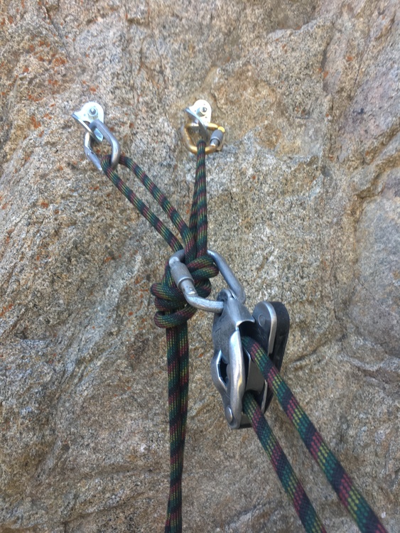 Lead belaying directly on the anchor with a grigri