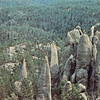 This is a photo that Paul Muehl had taken and produced into a postcard for his climbing friends. For several years in the late 1970's to the early 1980's we had a group of friends always show up for the second week of August and we all climbed and climbed and climbed. One day we would all go to the Ten Pins and do them all. This is a photo of someone on every summit. This Climb-a-thon was August 1979