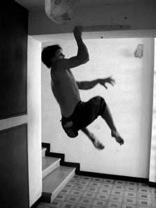 Here's a picture of "The Man" just finishing his <br>
third set of twenty fingertip one-arm pulls <br>
(warming up)_ before he left home to hit the <br>
Maze and send "Little Monster."
