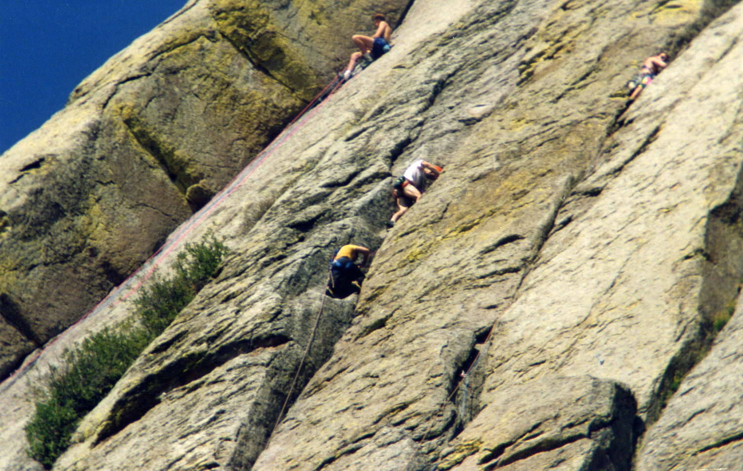 Busy day on the east face. From left to right, The first belay on Soler