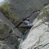 Mike half way up the first pitch, jamming the crack. 