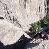 Rob Lewis crusin' the final moves to the top of East <br>
Face, Spire 2.