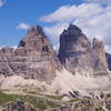 Tre Cime de Lavaredo from the south. <br>
<br>
Photo taken from the summit of Torre Wundt.  The Aronzo Hut can be seen in the lower-center of the photo.