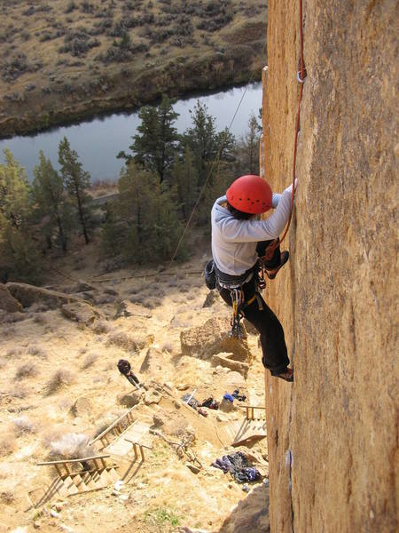 My wife following Karate Crack. Photo taken from bolt anchors atop the route (inside chimney).