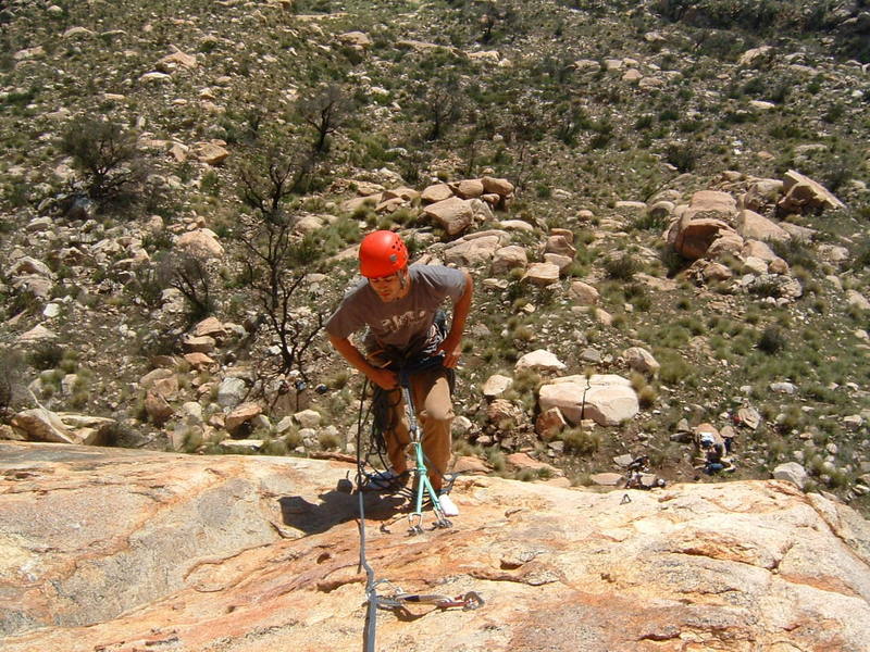 Ramon enjoying the hanging belay at P1 on Leonids.
