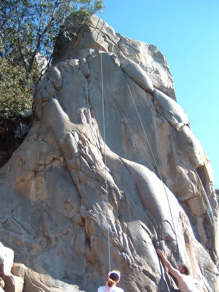Climbers tope roping Black. Easy Rider is the face directly below the anchor.