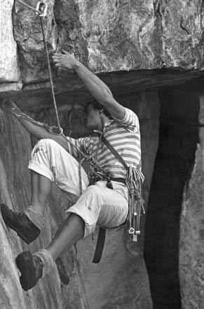 As classic as the previous photo. Mid to late 70s as evidenced by the painters pants (note bloody knee) and green Shoenards. I've got the horn at the end of the crux and am reaching back to clean a piece placed to limit the second's swing. Hexes on 9mm and big SMC wedges. Photo by Hardie Truesdale?