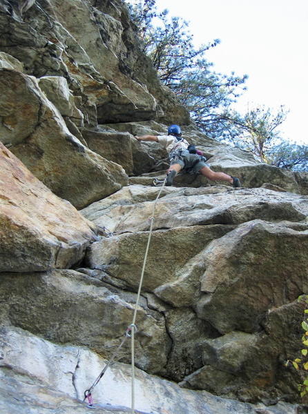 Mike Amato halfway up the second pitch. The crux notch is between his first two pieces of pro, left of the rope line.