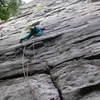 Jean Aschenbrenner starting the traverse on the first pitch of Maria.  She is just above the crux bulge on Frog's Head.