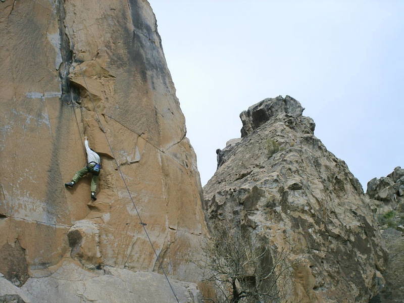 Photo by Tom Schuster of myself at the crux