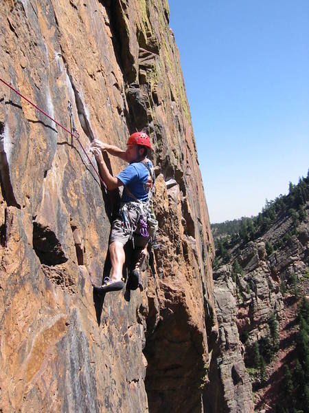 The key to stepping across on Rosy Crucifixion, step low and use the lower handhold. 5.10