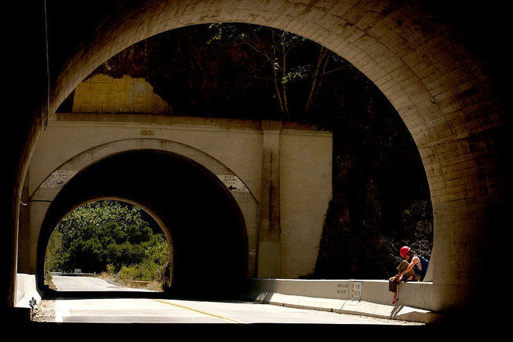 Liza Butler, of Sausalito, California, un-shoes at the top of the climbers trail after another spectacular visit to Wheeler Gorge.<br>
www.EarthworksImagery.com