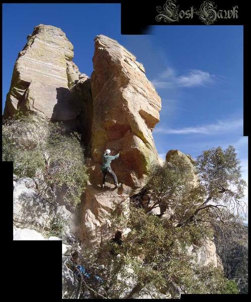 Lost hawk pinnacle viewed from below stupid human tricks. Composed of 6 photos merged together to create a great view. Chihuahua Power and Puppy Chow can be seen in the distance, and Dan is climbing Dog Daze, Belayed by Dana. A very cool climbing area.