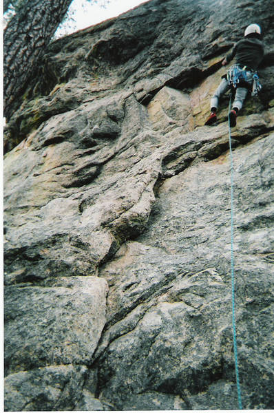Desicon moving through the "side-cling/ lieback" above bolt #2 preparing to clip bolt #3 and initiate the actual crux sequence.
