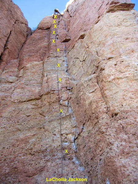 LaCholla Jackson. Climb the steep corner with stems, laybacks, and face moves.