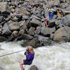 The tyrolean traverse across Boulder Creek.  Gaelyn Crowder, age 7, putting a brave face on it.