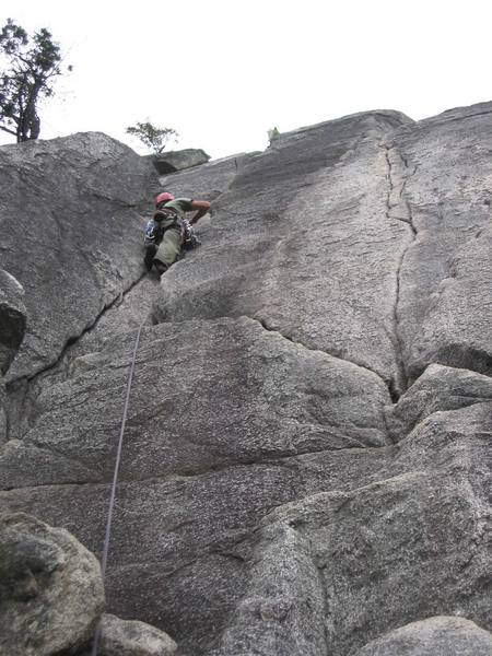Climbing the Corner Crack (5.7+) at the Smoke Bluffs.
