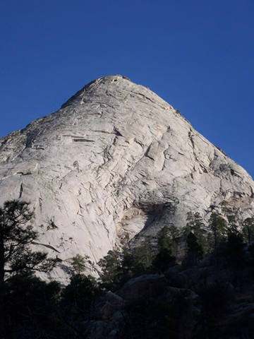 Sugarloaf Mountain. The Flea Tree Dihedral route starts to the right of the obvious cave. There are other long, scary routes that start to the right of the cave.