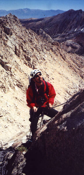 Scott belaying on the route