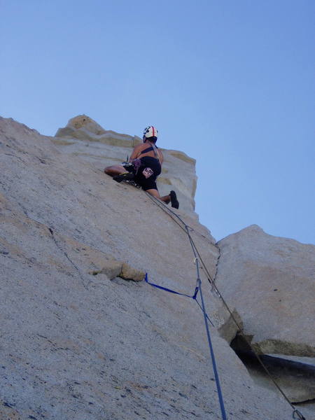 Calvin Kilcrease leading above the 10a finger crack on P.4.