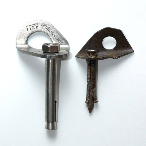 Here is the aforementioned Nail Drive anchor bolt removed from atop T-Crack. It is pictured here alongside a brand new 12mm Fixe Triplex expansion bolt. (A 12mm bolt is only slightly larger than 3/8". The Triplex is actually a 3/8" bolt with a stainless steel sleeve.)<br>
<br>