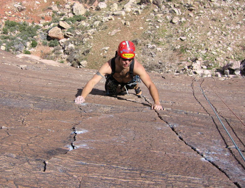 Brent Peters nearing the top of pitch 5. The climbing is sustained and delicate from here to the belay.