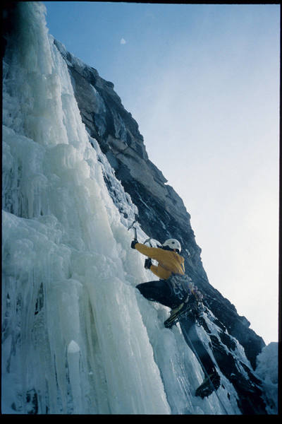 Roy Leggett on the start of pitch 1 (Jan '05). Very chandeliered ice on this day. Photo by Steve Su.
