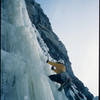 Roy Leggett on the start of pitch 1 (Jan '05). Very chandeliered ice on this day. Photo by Steve Su.