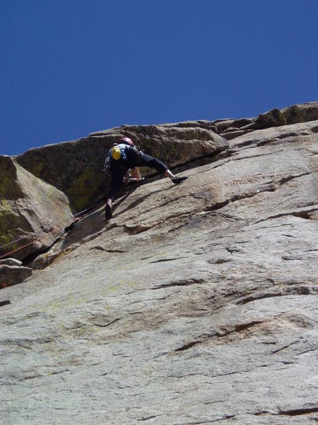 Luke's right foot is on a good 1" ledge. Pull onto this, and you're done.