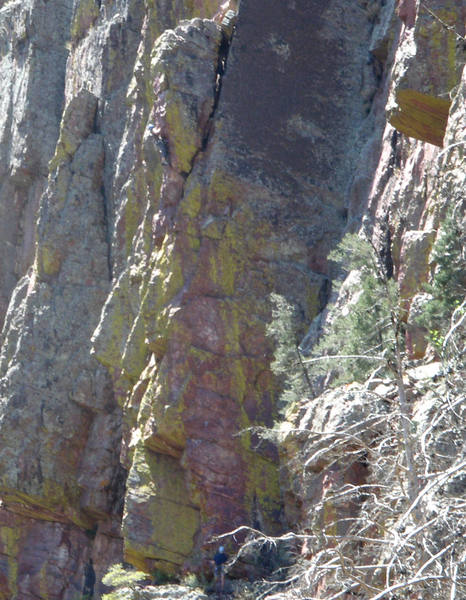 Sherrie, in blue helmet, going for the last bolt on Angel Wing's first pitch. She's at the bottom of the leaning tower. Doug is just visible on the ledge wearing a blue helmet, also. The more you stay on the overhang, the easier it is.