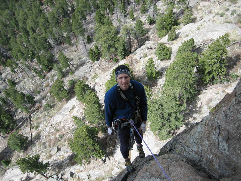 Taking a break while re-racking for the link up of pitches 4 and 5 of TurnKorner on Sundance Buttress, Lumpy Ridge.