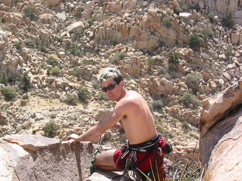 Tony atop the Lost Horse on a windy day in J-Tree, California. Image by Patrick Walters, 2002?