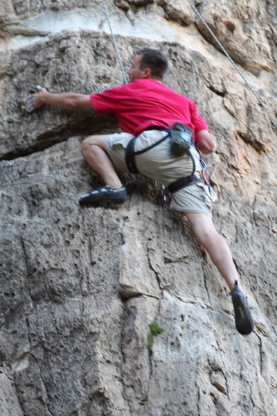 Bro Jason TR'ing and just past the crux moves and searching for that next hold