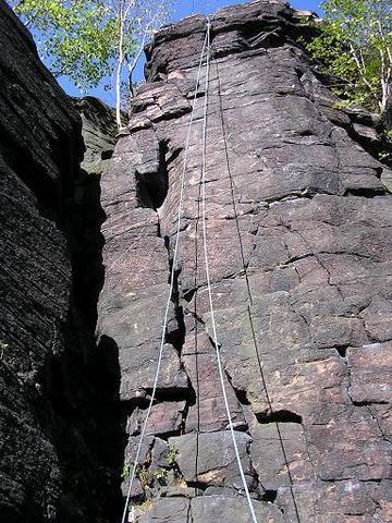 The Thinker (5.7) is the crack system on the left side of the face. The Dreamer (5.10b) goes directly up the center of the face.