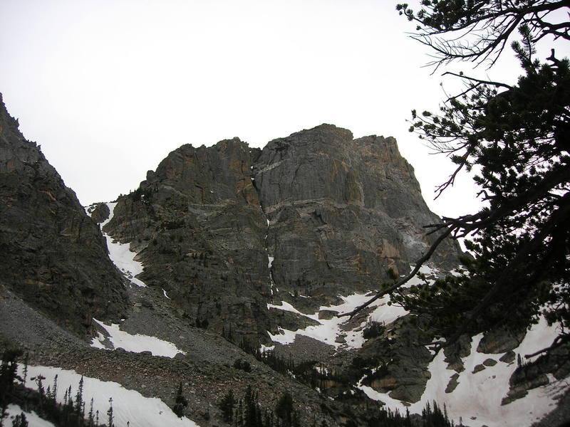 Beta Photo of Hallett Chimney: The route follows the thin band of snow in the chimney running up the middle of the face.
