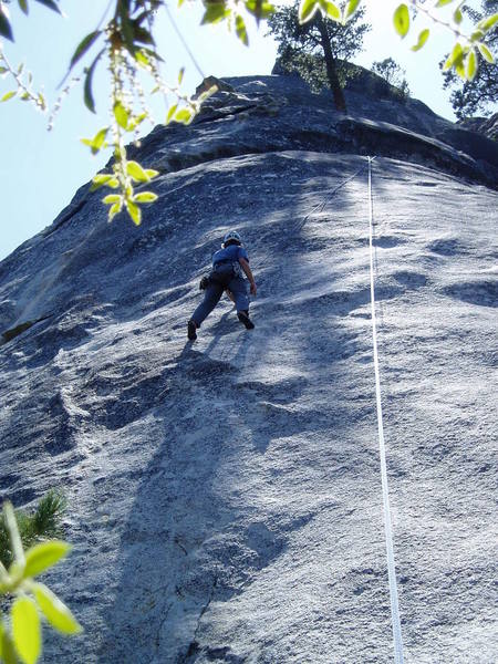 The knob and last decent holds can be seen a few feet below Ivan's feet. It's nothing now except blank wall smearing for a long ways! The three bolts can be seen here and the climbing is solid crux moves all the way getting past the 3rd bolt.