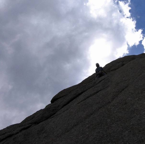 This is a good pitch when it's clouding up. It's short and would be easy to bail from. The climb goes right from where Ivan is but might be more fun with another bolt to the arete.