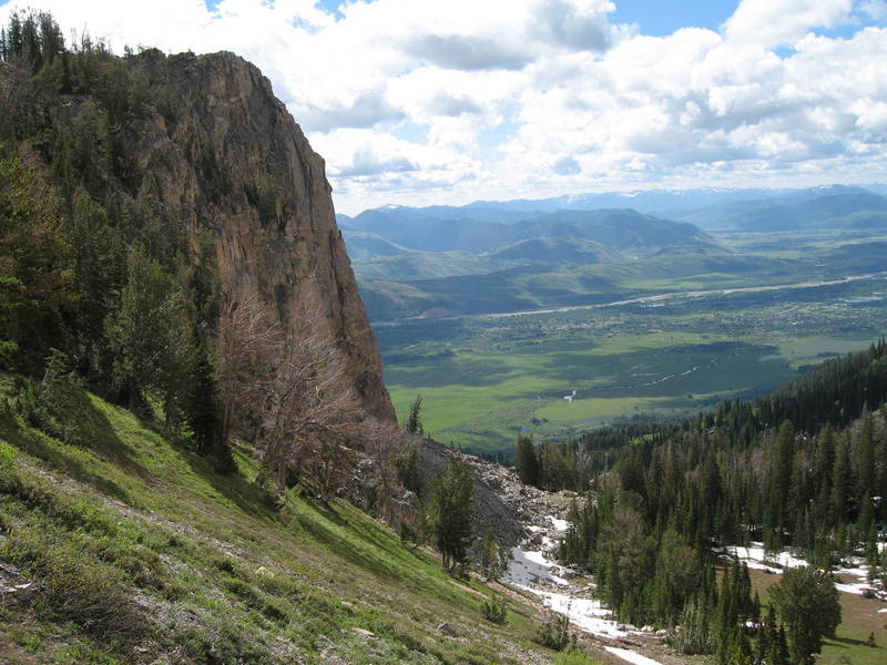 View from the approach trail. This is the left side of Rock Spring Buttress. The valley of Jackson Hole is below.