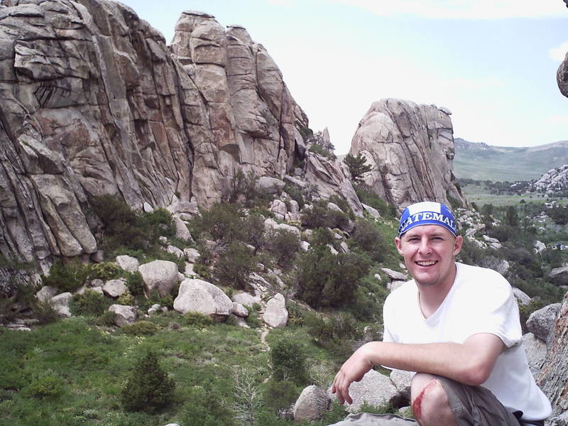 Todd on top of Owl Rock, with the Breadloaves in the background.
