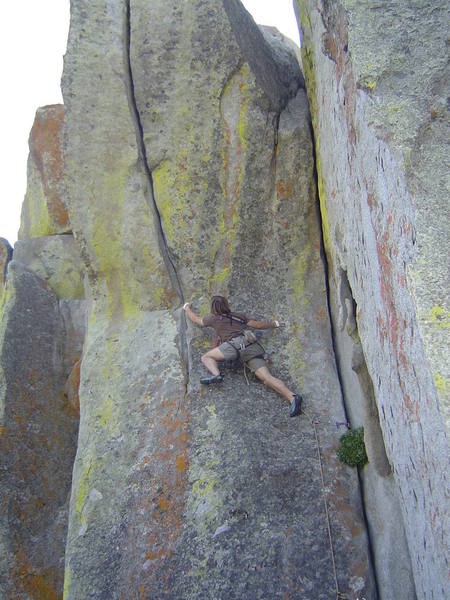 Chris Garner, leading off on the beautiful 5.11 overhanging Hand Crack on the N. Side of the Upper Breadloaves