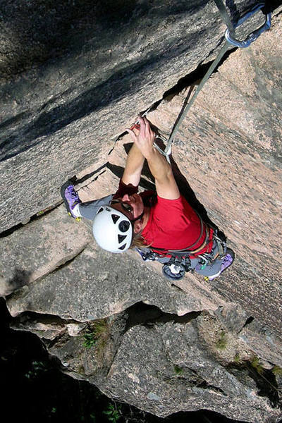 Marisa Fienup nears the top of "Old Town," in Acadia National Park, Maine.