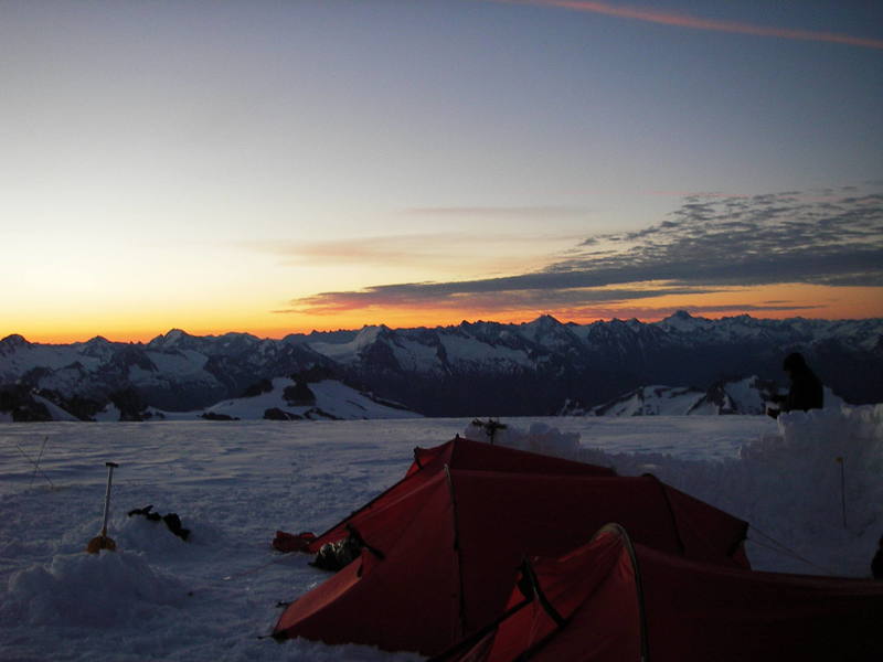The Dragontain high camp on the Upper Tellot Glacier at sunrise. Photo by Tom Gray.