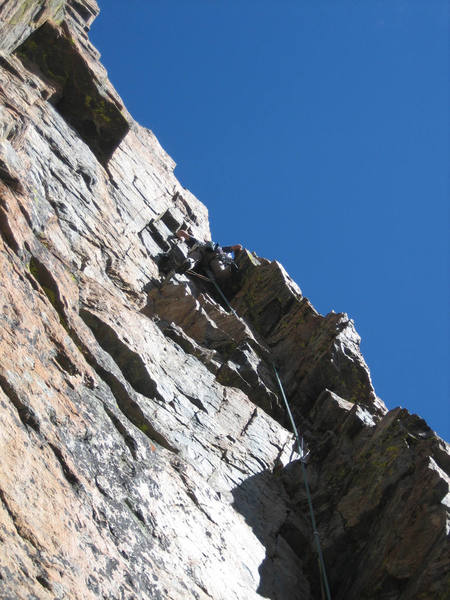 Mike Amato reaching the top of the fading dihedral on pitch 1.