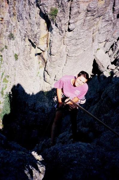 Jason Haas, a partner present, raps down from the Khayyam Spire of the South Dakota Needles. Photo by Tony Bubb, 7/06.