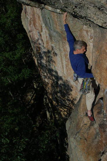Marc Gravatt climbing up from the final traverse into the v-notch for the direct finish.
