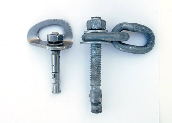 To give you a sense how BIG this bolt is, here's the aforementioned failed 1/2" wedge bolt alongside a traditional 3/8" wedge bolt.
