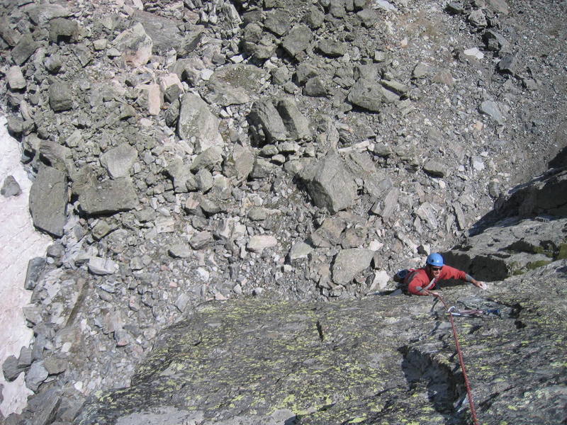 Shane pulling the final bulge onto the slab of the 2nd pitch.